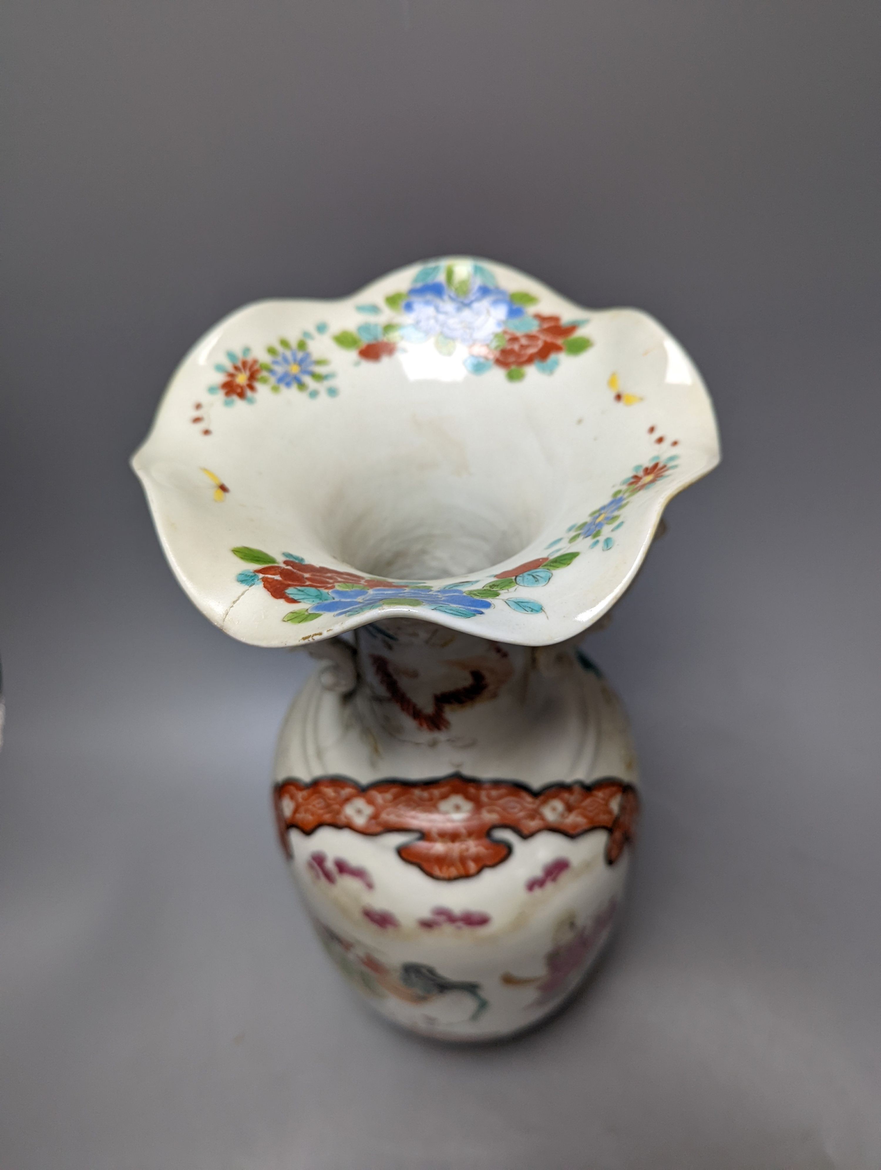 A Chinese famille rose vase and two ginger jars, together with a Japanese vase, 38cm